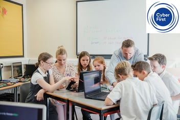 CyberFirst school children sitting at desks