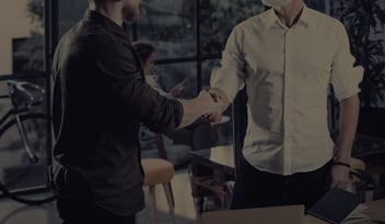 Two people shaking hands